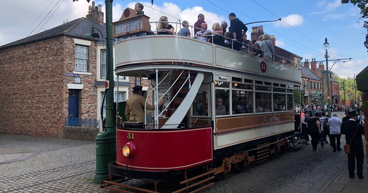 people sat on a tram at Beamish Museum